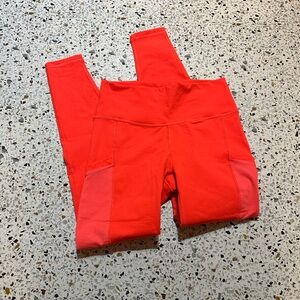 Fabletics Vibrant Orange/red powerhold leggings size small women’s